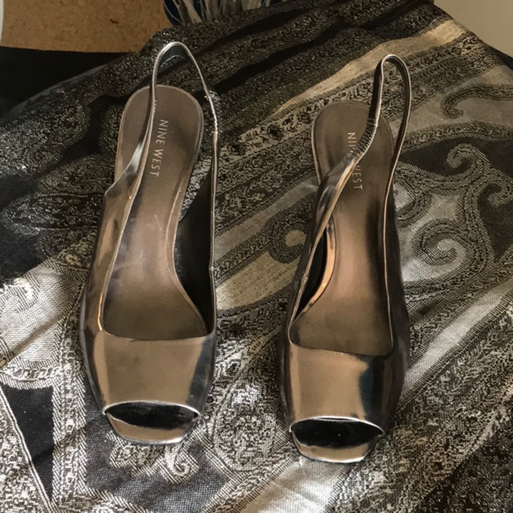 Beautiful Nine West brand silver shoes!  Size 7 M